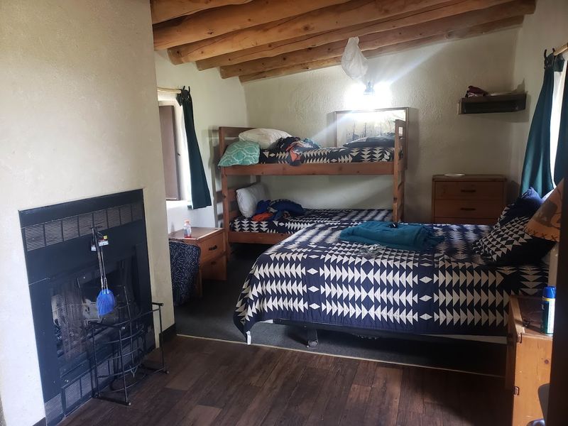 Adobe Lodge With A Fireplace And A View