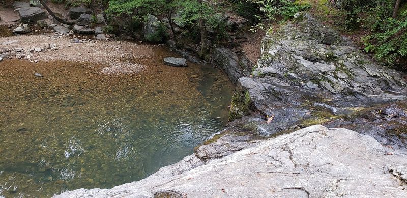 A Gentle Walk Surrounded By Flowing Water