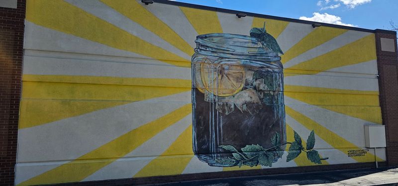 The Mural Lives On The Visitors Center Building