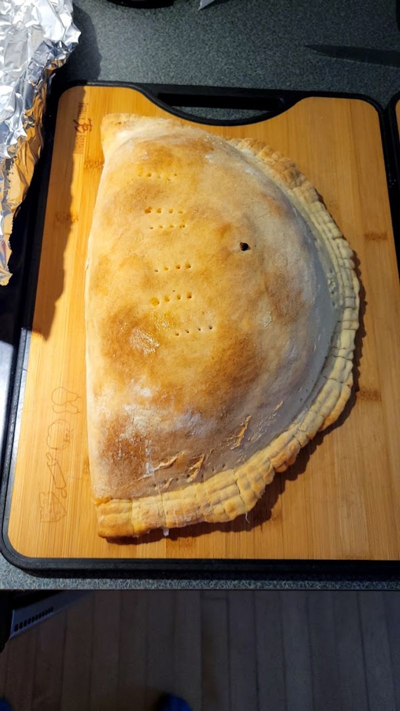 The Pizza Puff Is Almost Comically Huge