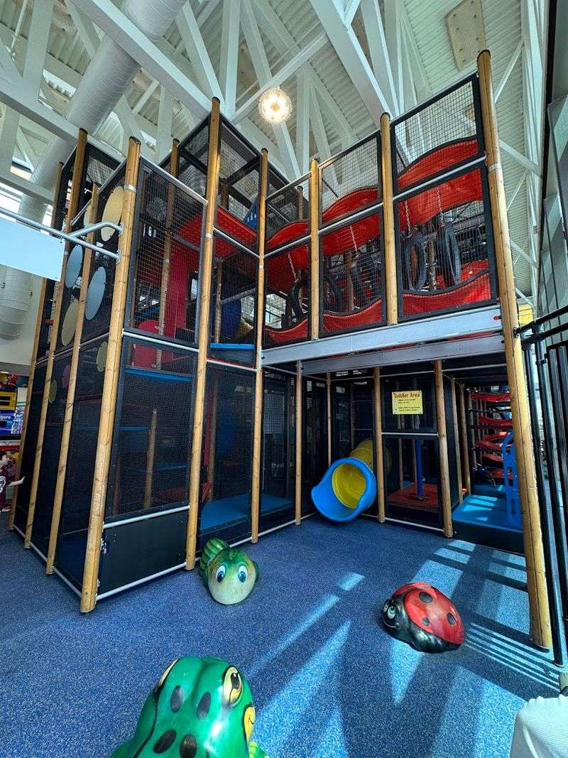 The Play Area Features A Climbing Structure That Reaches Over 22 Feet High