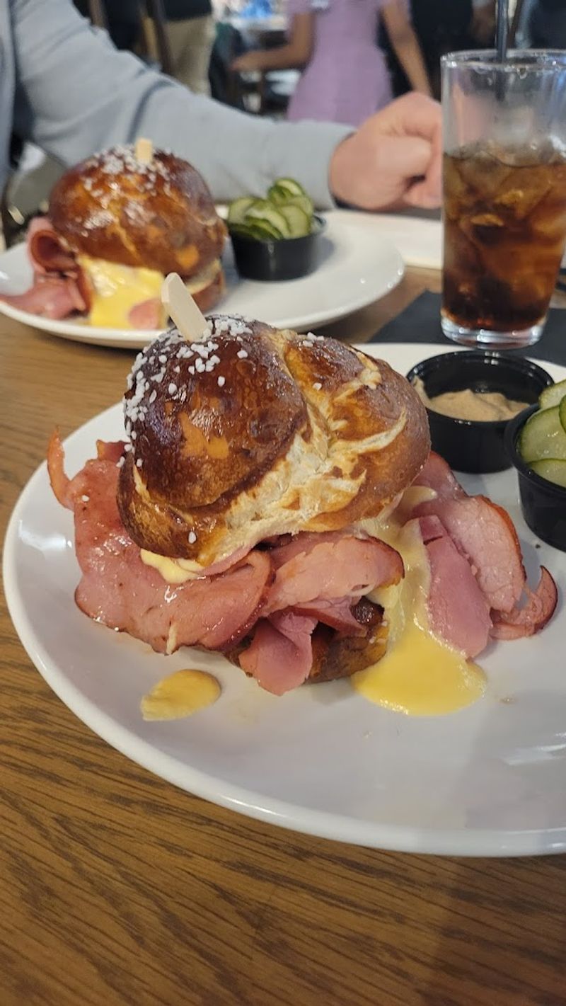 The Pretzel Roll Sandwich With Ham And Cheese Is Unforgettable