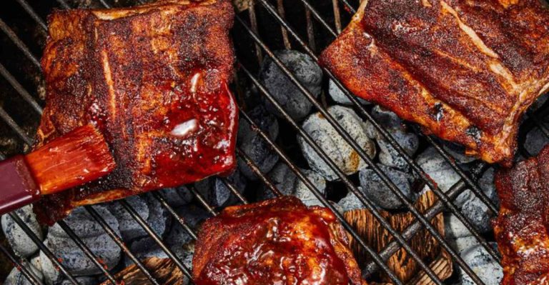 The Pros And Cons Of Boiling Ribs Before You Toss Them On The Grill