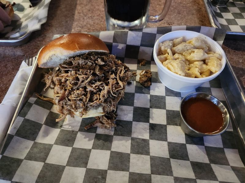 The Pulled Pork Sandwich Is Juicy, Stacked, And Surprisingly Affordable