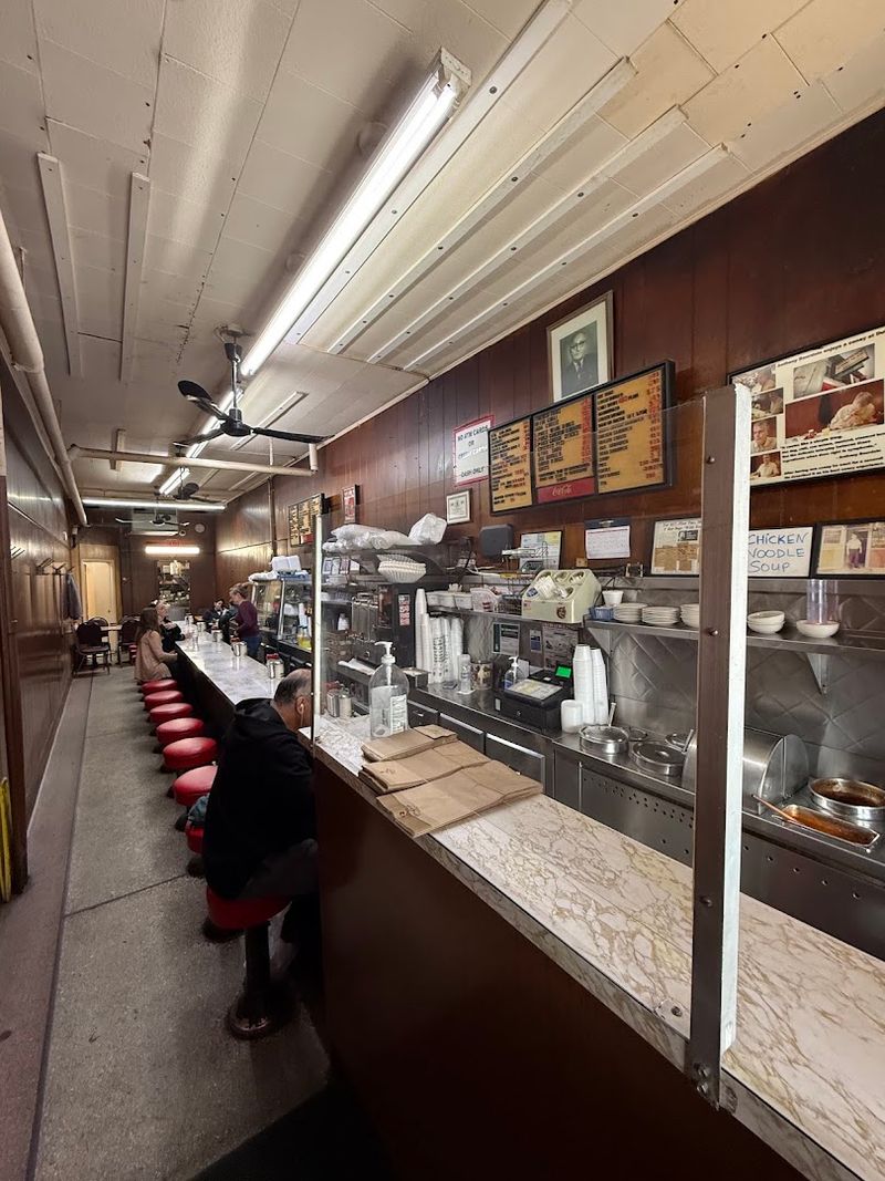 The Red Awning Has Watched Vernor Change For A Century