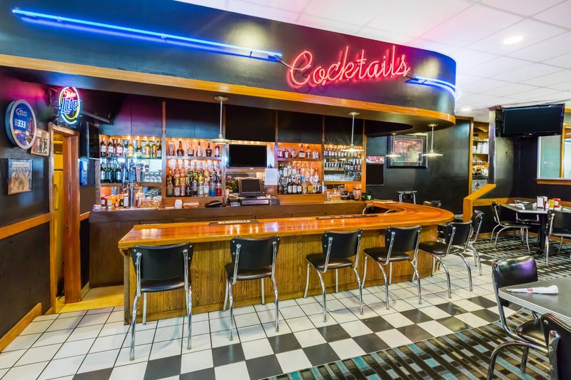 A neon hello at sunrise