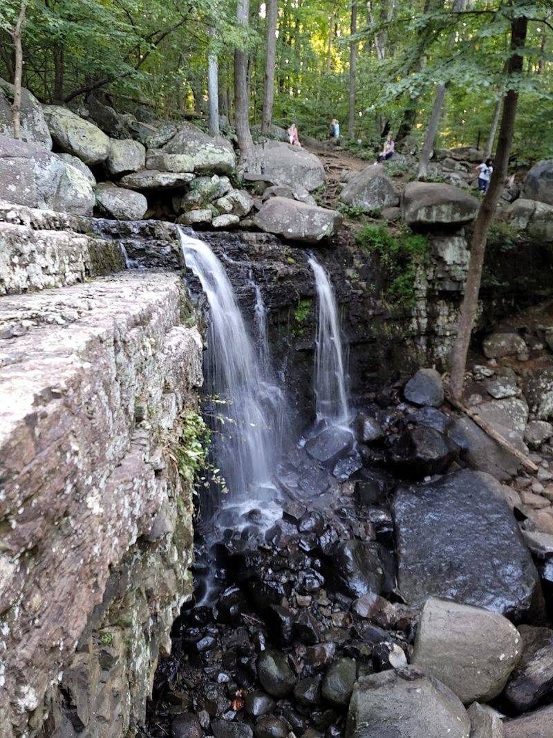 A Waterfall Waits At The End Of The Trail