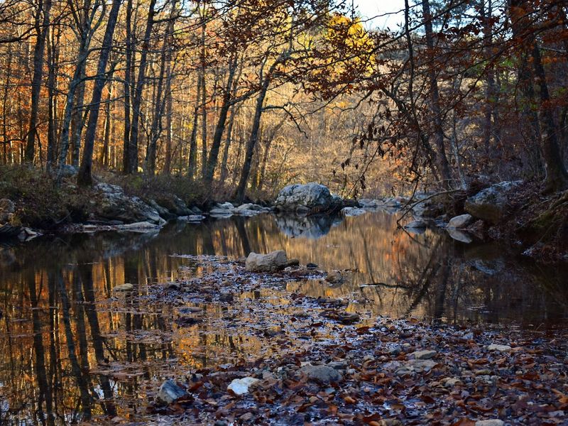 Crystal Pools Beneath Towering Cliffs