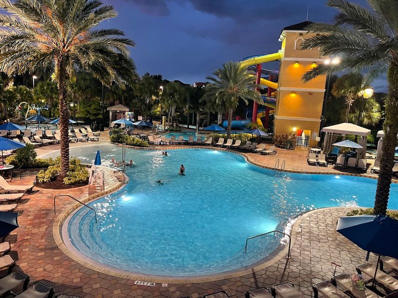 The Legendary Outdoor Pool Area With Slides, A Lazy River, And Hot Tubs
