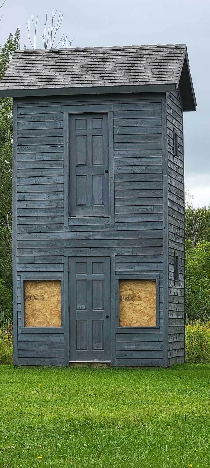 The Tall Outhouse Is The Landmark