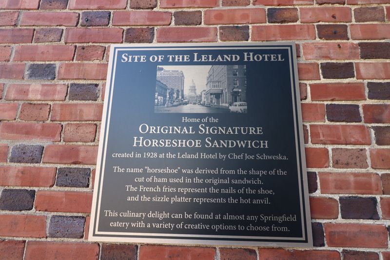 The horseshoe is generally traced to the Leland Hotel