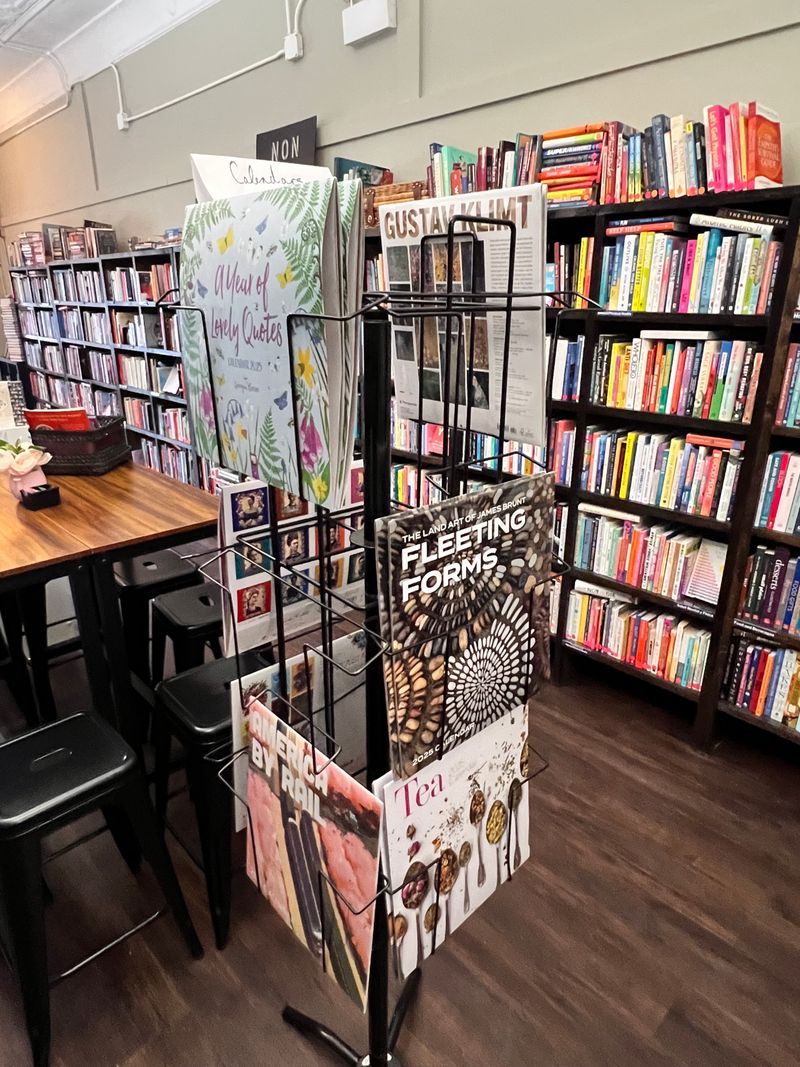 The shelves combine new finds with used-book character