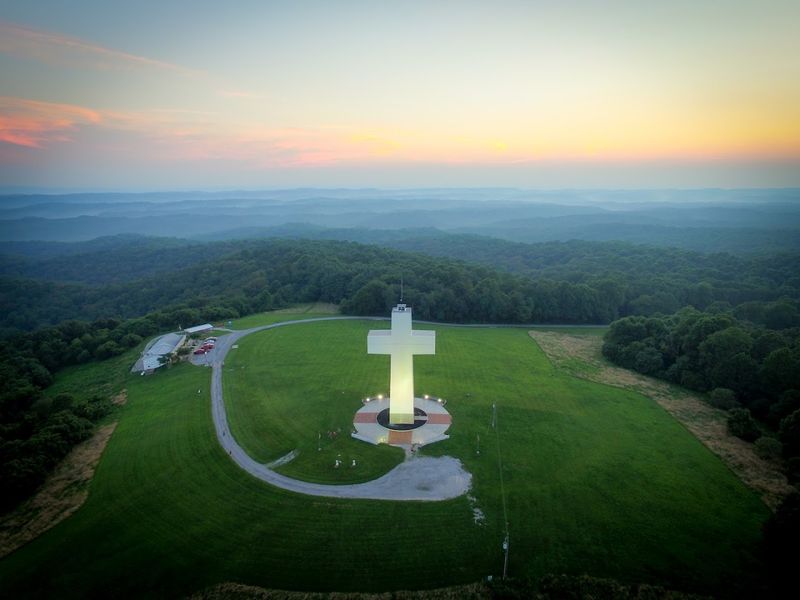 The towering cross against open sky The towering cross against open sky