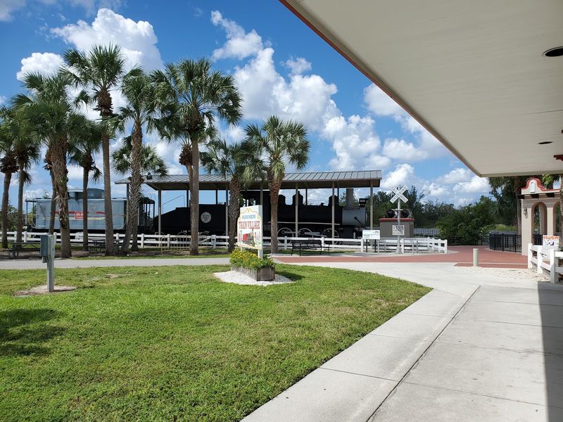 The First Look: Lakes Park, Palms, And A Locomotive Greeting