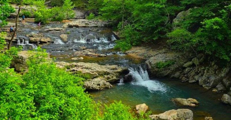 This Hidden Arkansas Waterfall Hike Leads To A Peaceful Swimming Hole