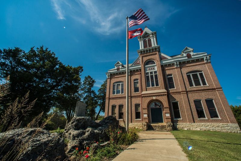 A Brick Facade Rising Over Open Prairie