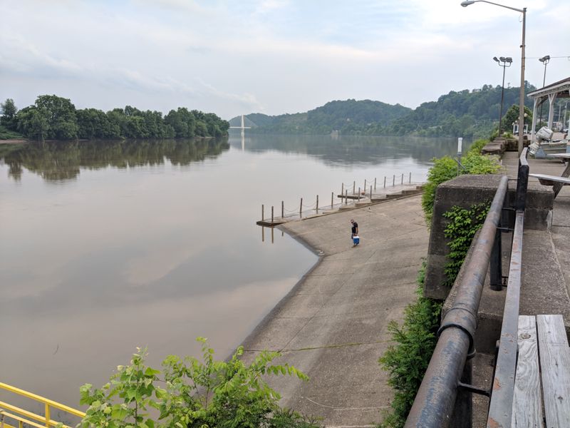 Reading The River From The Sidewalk