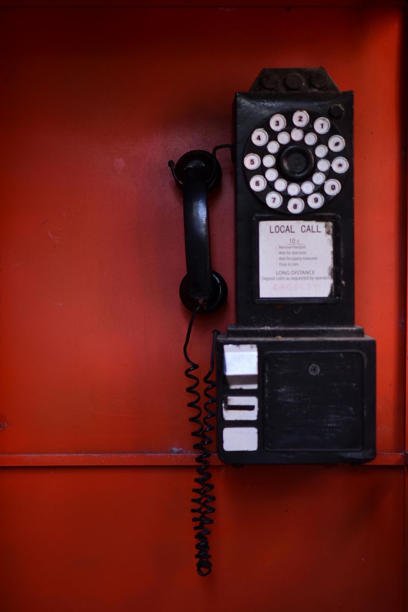 Reserve The Red Leather Booth With A Phone Within Reach