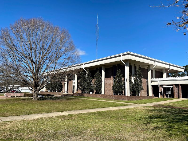 A Courthouse Square Glowing After Dark