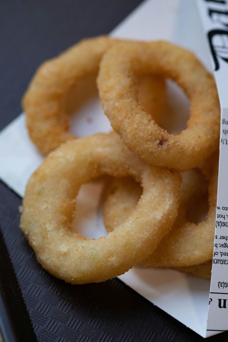 The Onion Rings Are The Real Reason People Show Up