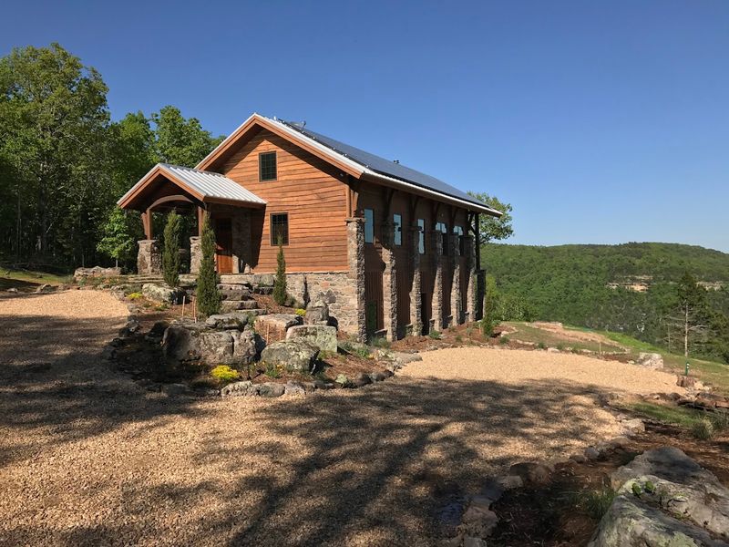 Timber Frame Charm Surrounded By Trees