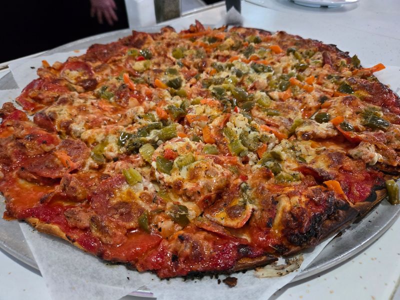 Toppings Spread All the Way to the Edge