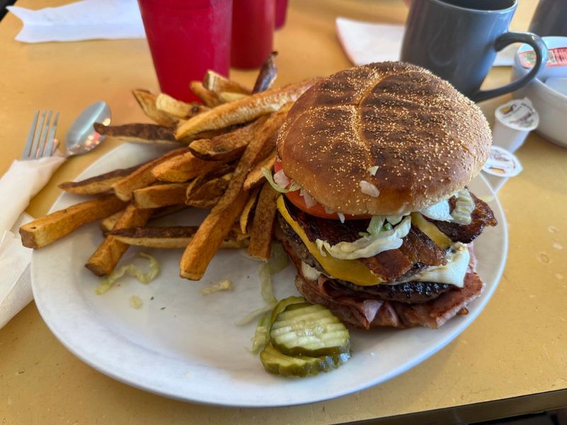 Towering Burgers and Hand-Cut Fries Towering Burgers and Hand-Cut Fries