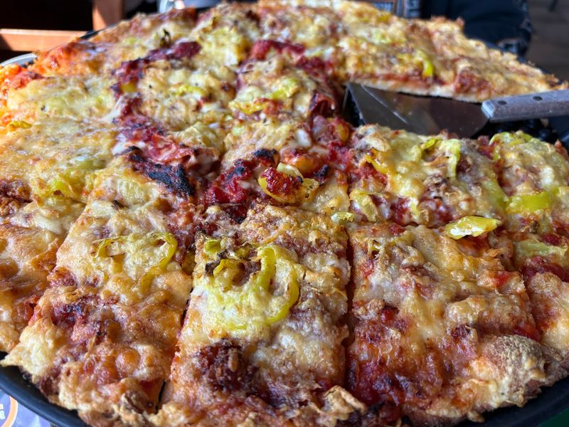 Notice The Under-Cheese Technique