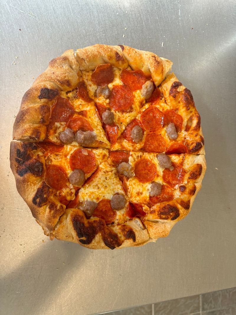 Try The Modeltowner Meat Pizza
