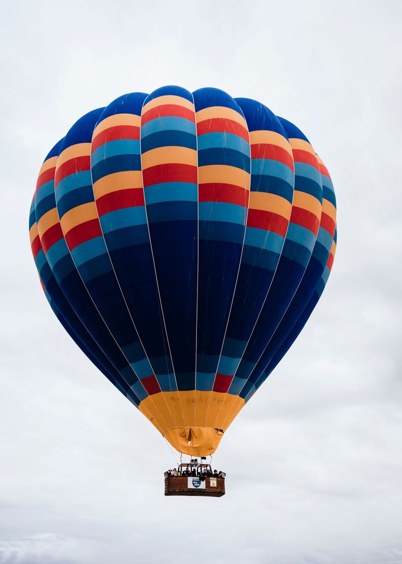 Twenty Balloons Handing Out Candy