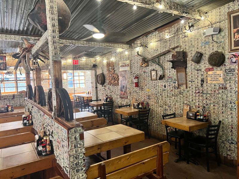 Walls Wallpapered in Dollar Bills