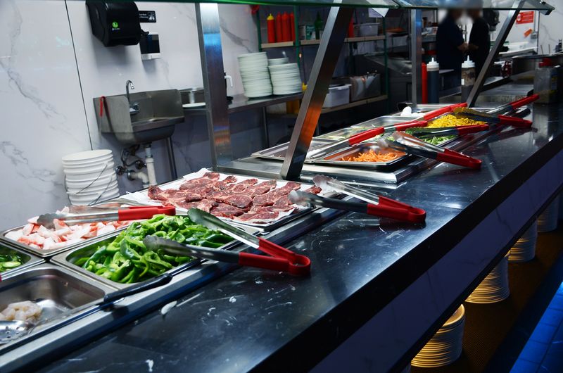 Watch Your Dinner Sizzle At The Grill Station