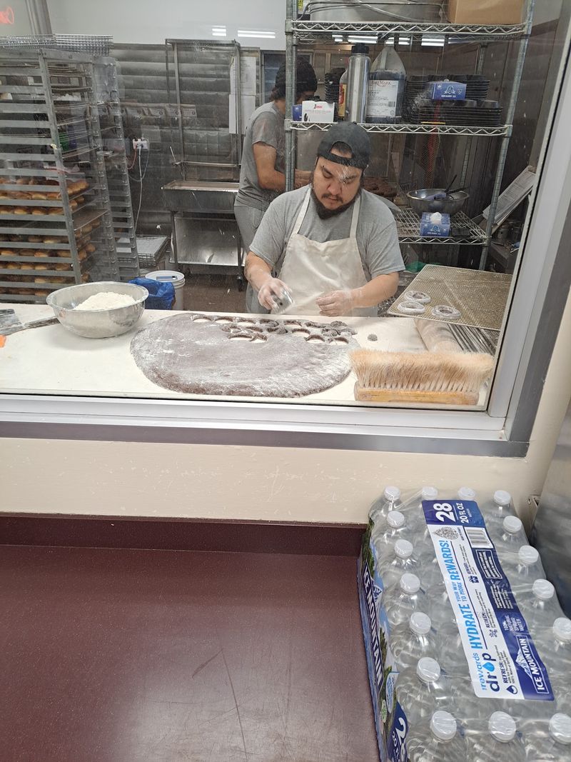 Watching the Bakers Work Behind the Glass