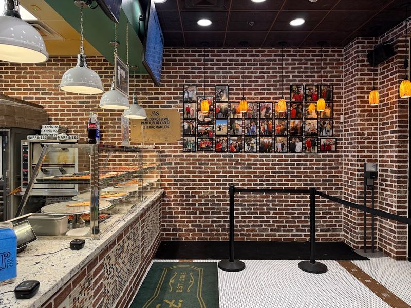 The Story Behind Prince Street Pizza