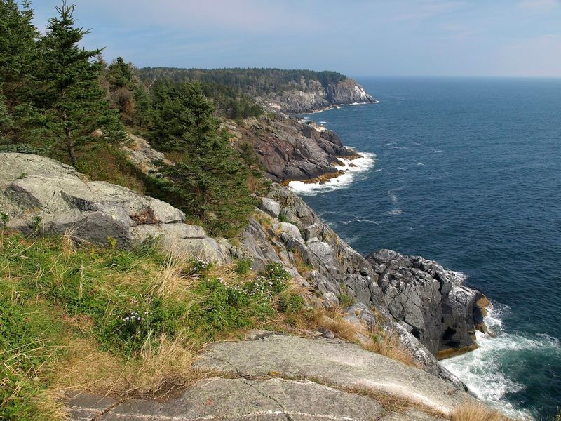 Where Cliffs Meet Wild Sea