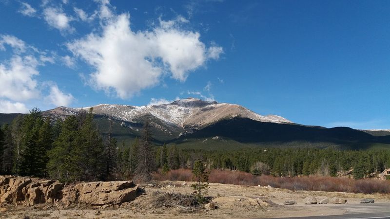 Where The Rockies Frame Every Street Corner