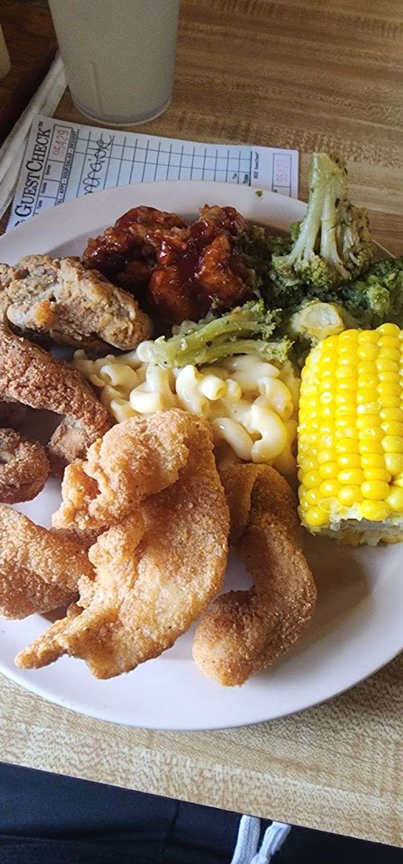 Heaping Plates Of Shrimp Hush Puppies And Comfort Sides