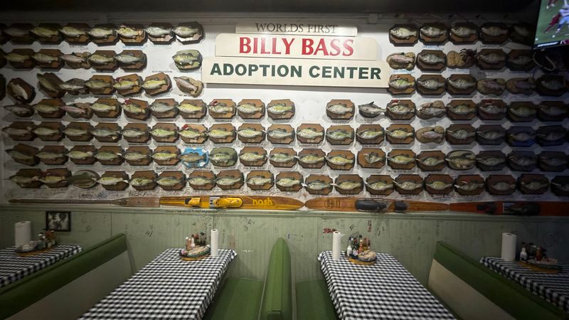 Walls Covered In Quirky Memorabilia And Fishing Tales