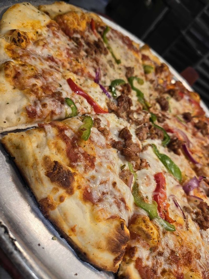 Wood-Fired Pizza That Actually Earns Its Place At An Italian Buffet