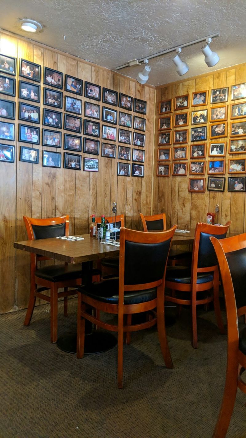 Wood Panels, Old Photos, And A Midwestern-Basement Warmth Wood Panels, Old Photos, And A Midwestern-Basement Warmth