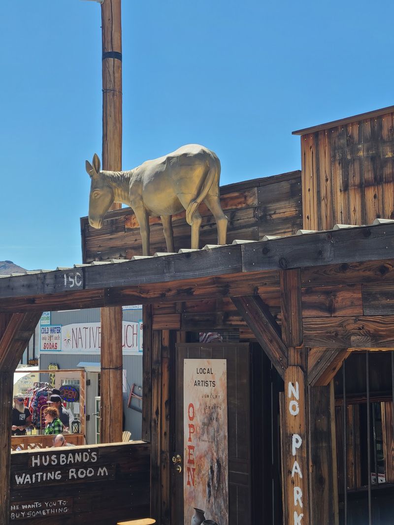 Wooden Sidewalks Lined With Donkey-Themed Shops