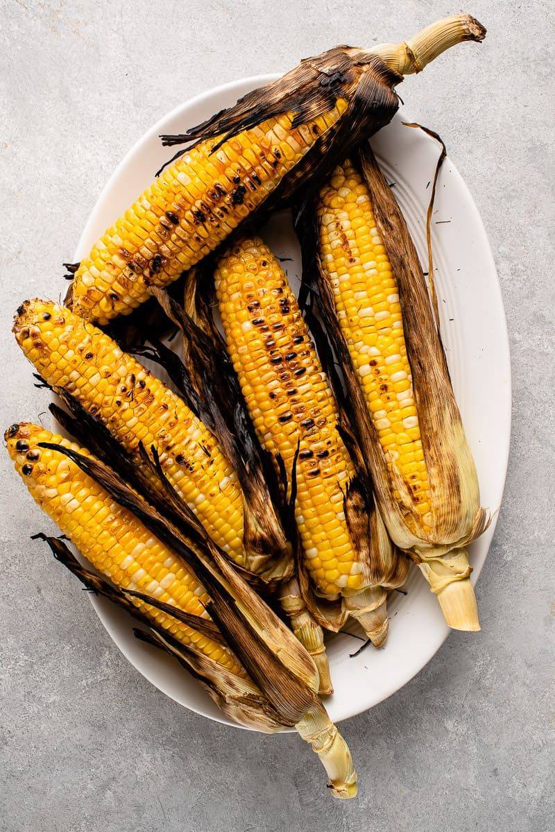 Tossing Dry Husks Straight Onto The Grill