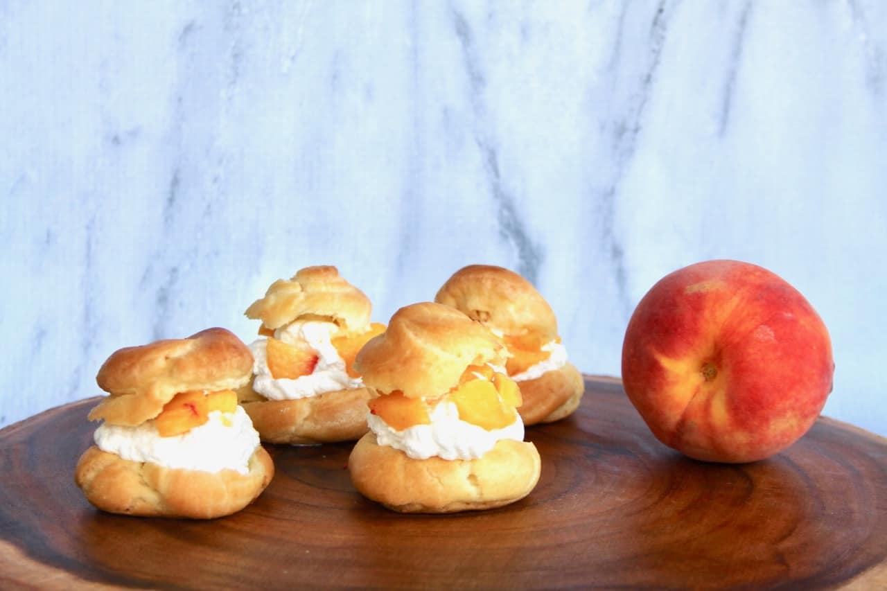 the ultimate cream puffs with peach chantilly cream whipped cream 