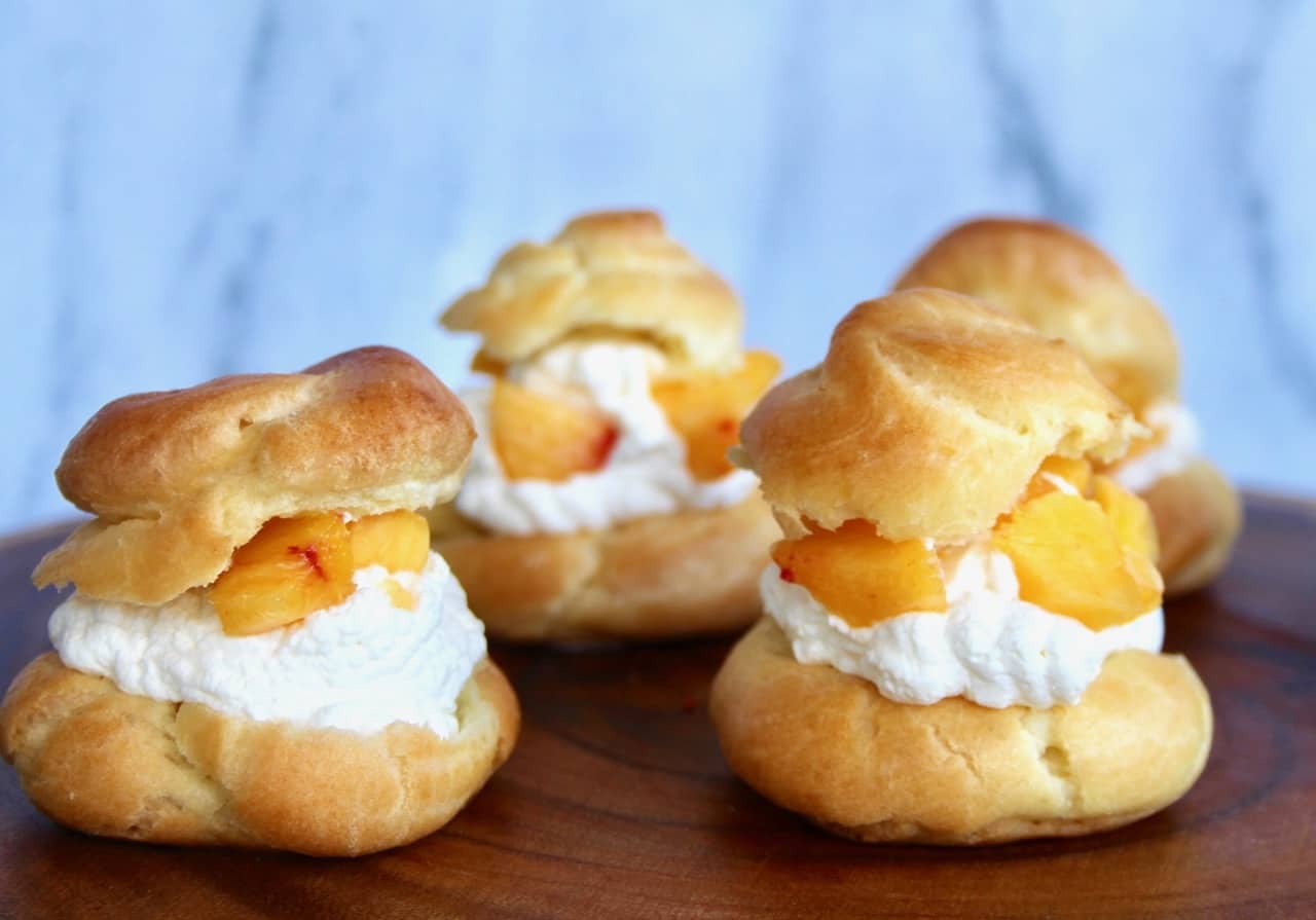 the ultimate cream puffs with peach chantilly cream whipped cream 