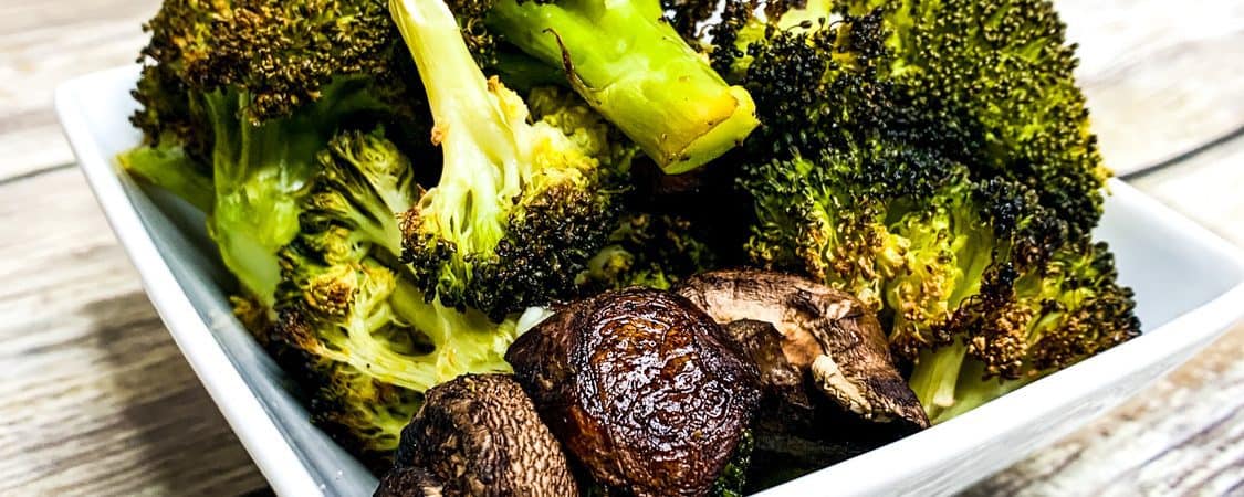 just made the best roasted broccoli and mushroom ever! These vegetables are so soft and sweet with caramelized edges – It is so good, I may or may not have eaten the entire pan by myself.