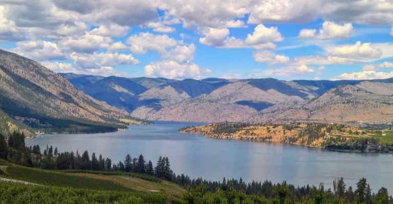 This Enormous Washington Lake Has 100 Miles Of Shoreline And A Mountain Rising Beside It