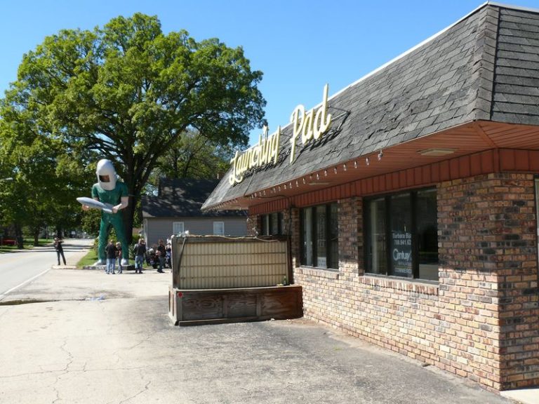 A Giant Spaceman Holding A Rocket Stands Proudly Along Route 66 In This Small Illinois Town