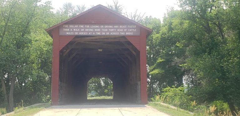 This Illinois Covered Bridge Still Lets You Walk Its Wooden Planks Over A Quiet Creek