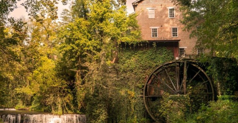 This Tennessee Water-Powered Mill Still Runs Machinery From A 32-Foot Waterwheel