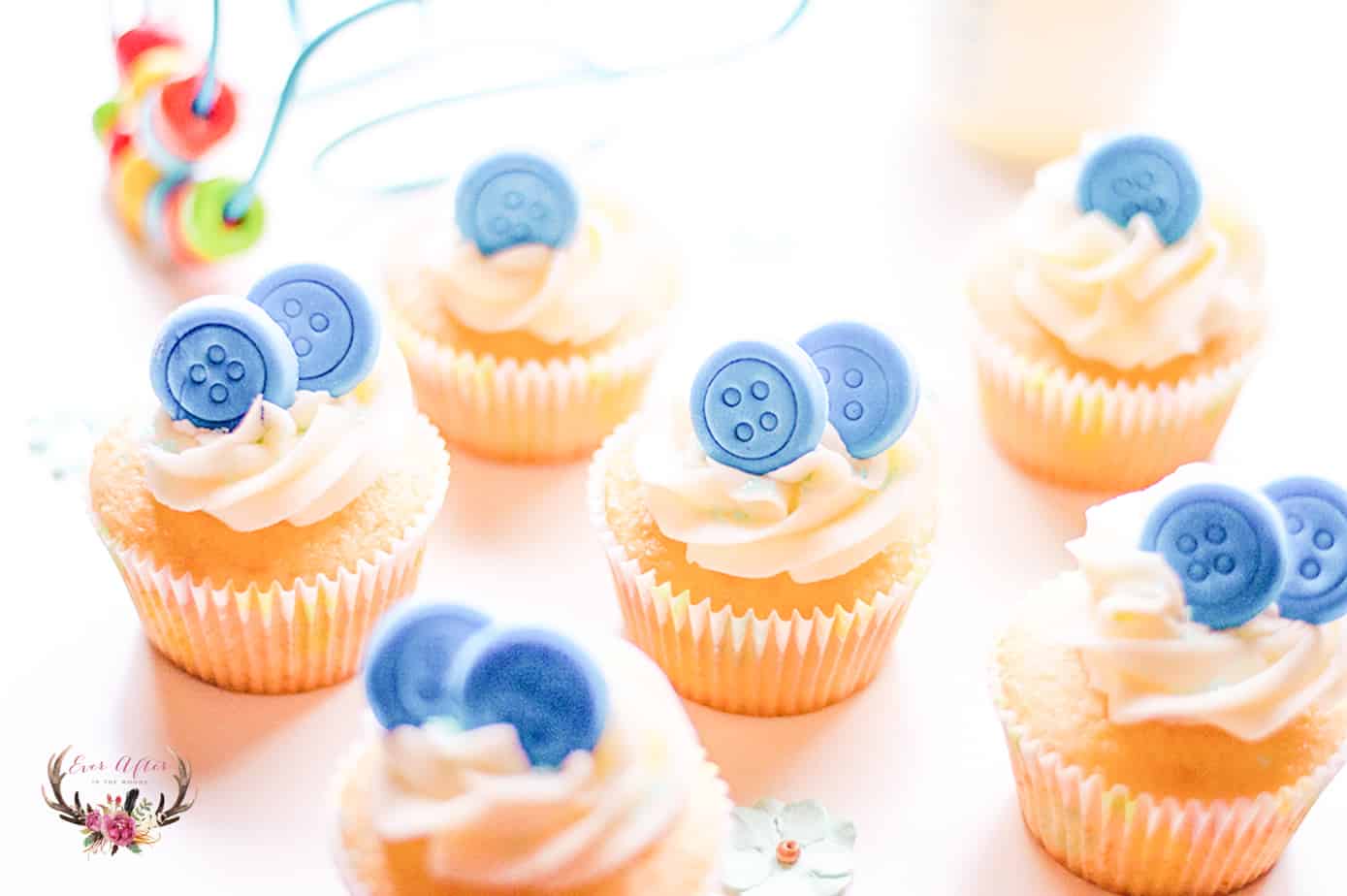These button cupcakes are the perfect dessert for a gender neutral baby shower. Simply make your cute buttons from the color of your shower theme.